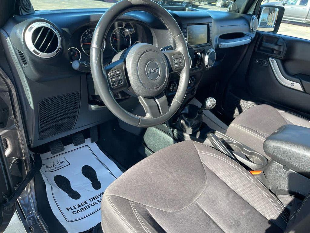 used 2014 Jeep Wrangler Unlimited car, priced at $15,450