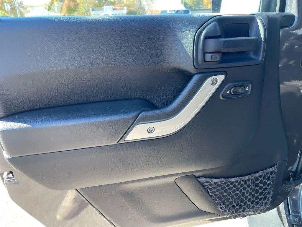 used 2014 Jeep Wrangler Unlimited car, priced at $15,450