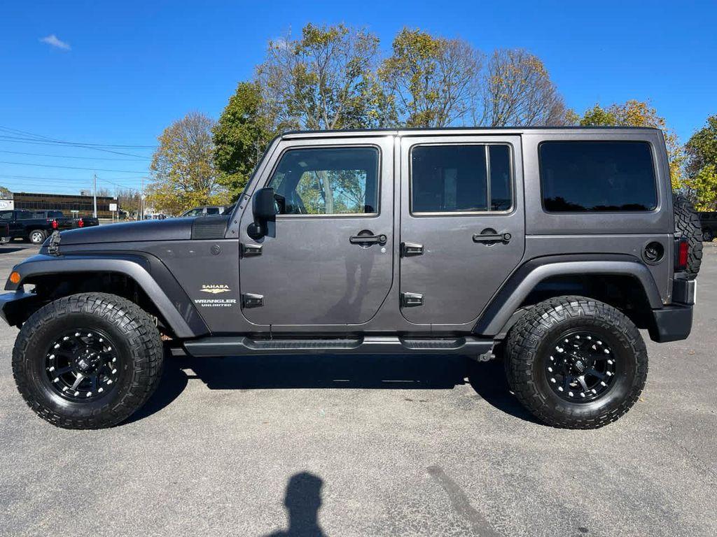 used 2014 Jeep Wrangler Unlimited car, priced at $15,450