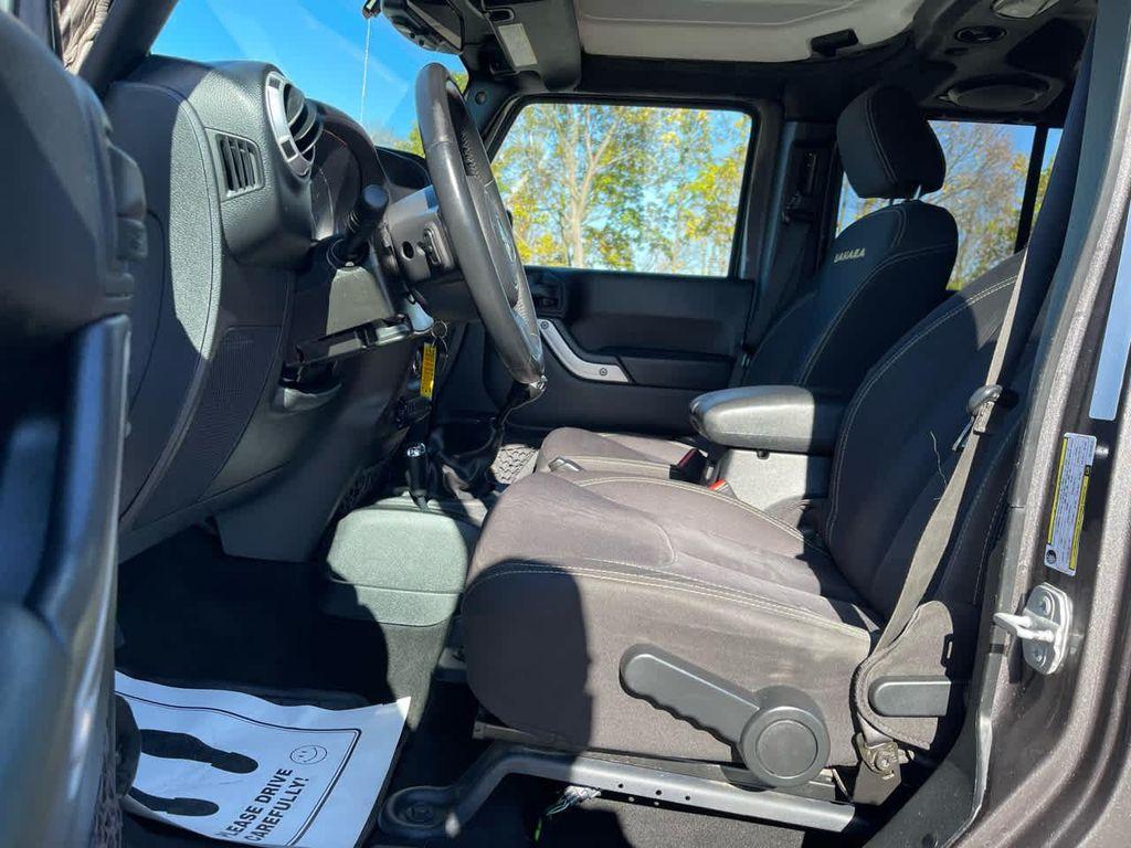 used 2014 Jeep Wrangler Unlimited car, priced at $15,450