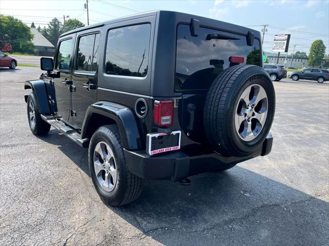 used 2016 Jeep Wrangler Unlimited car, priced at $18,700