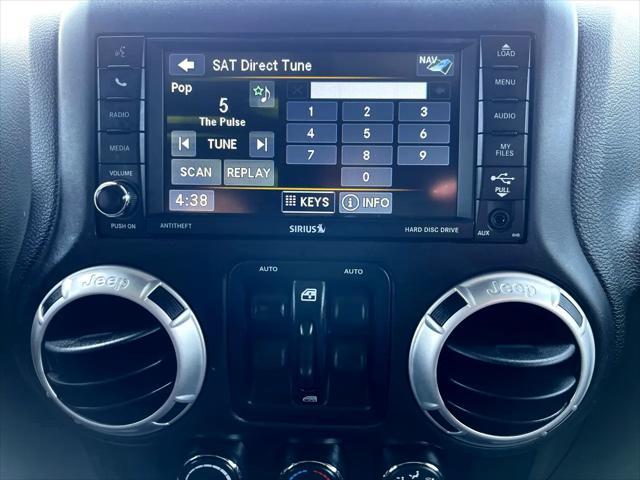 used 2016 Jeep Wrangler Unlimited car, priced at $18,700