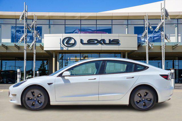 used 2023 Tesla Model 3 car, priced at $29,900