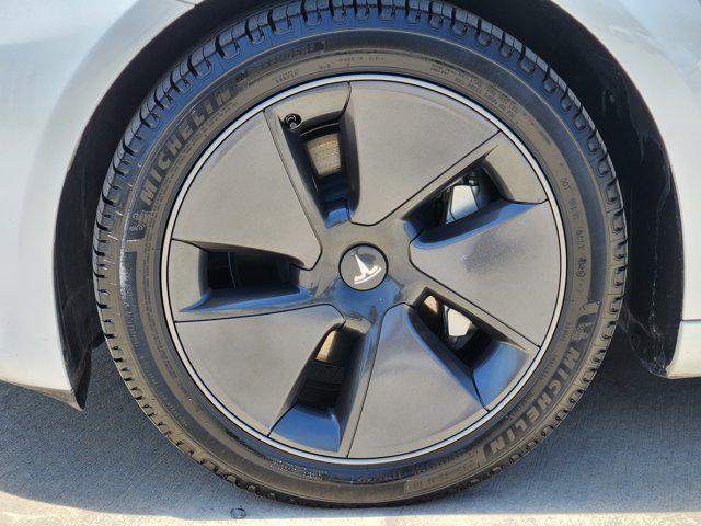 used 2023 Tesla Model 3 car, priced at $29,900