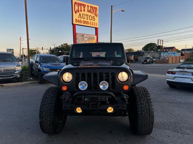 used 2011 Jeep Wrangler Unlimited car, priced at $13,995