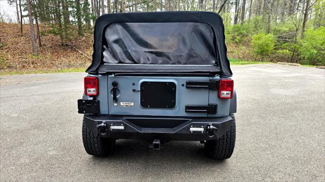used 2015 Jeep Wrangler Unlimited car, priced at $21,500