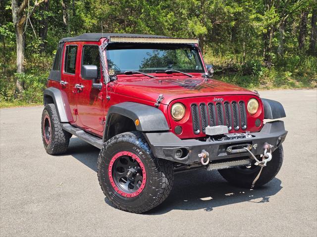 used 2012 Jeep Wrangler Unlimited car, priced at $17,995