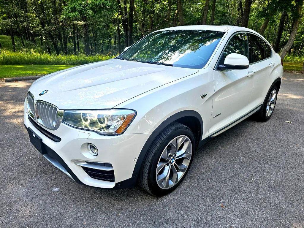 used 2018 BMW X4 car, priced at $17,995