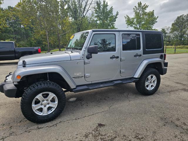 used 2015 Jeep Wrangler Unlimited car, priced at $19,495