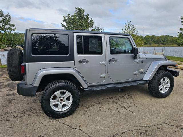 used 2015 Jeep Wrangler Unlimited car, priced at $19,495