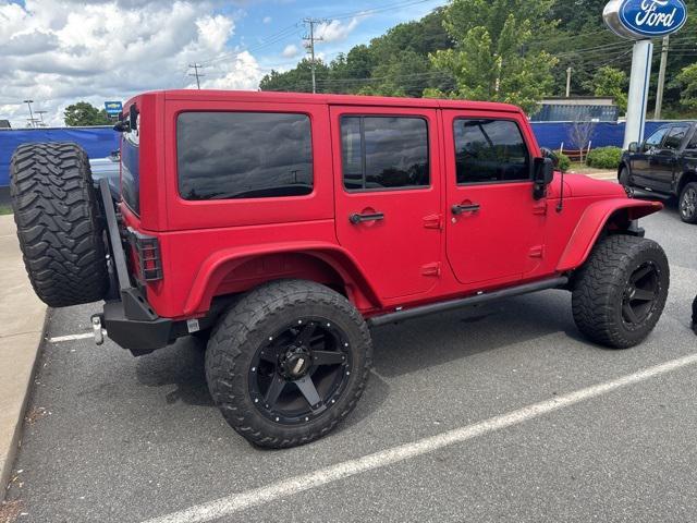 used 2014 Jeep Wrangler Unlimited car, priced at $18,998