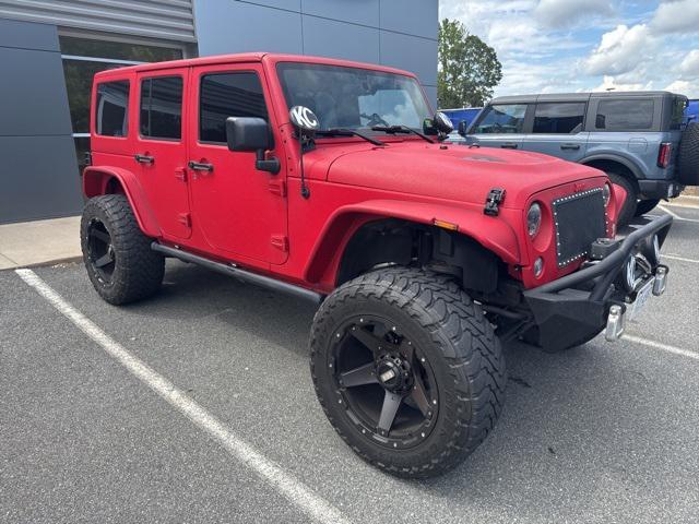 used 2014 Jeep Wrangler Unlimited car, priced at $18,998