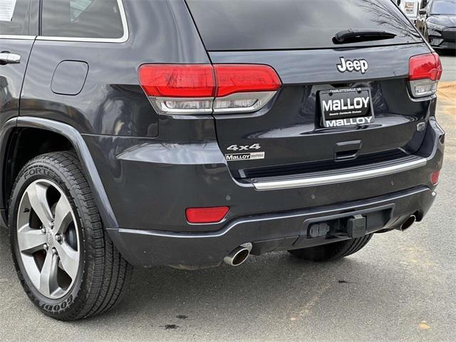 used 2014 Jeep Grand Cherokee car, priced at $14,934