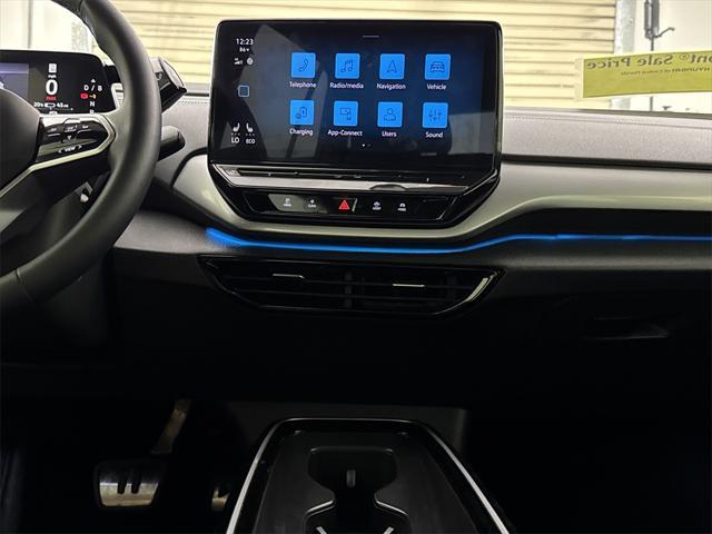 used 2023 Volkswagen ID.4 car, priced at $25,567