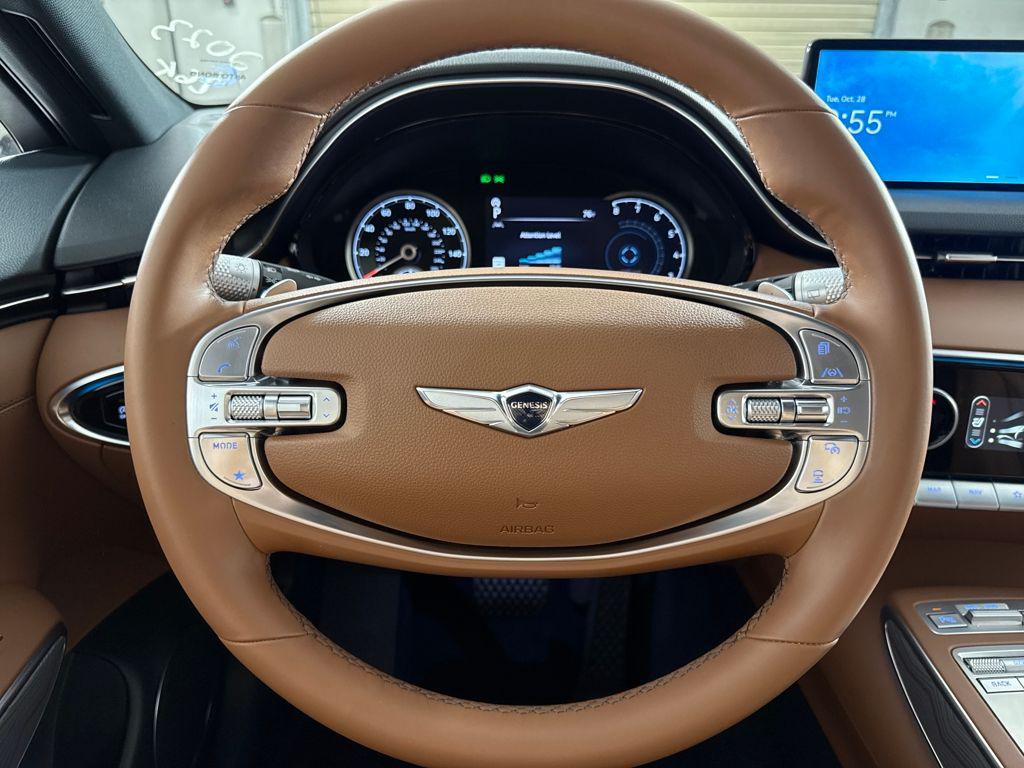 used 2023 Genesis GV70 car, priced at $37,150