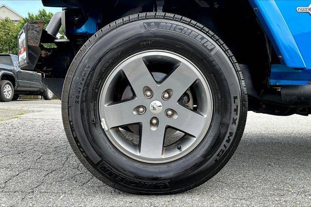 used 2015 Jeep Wrangler Unlimited car, priced at $16,795