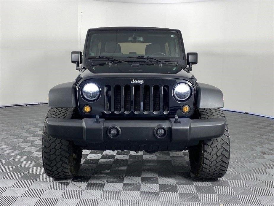 used 2013 Jeep Wrangler Unlimited car, priced at $23,891