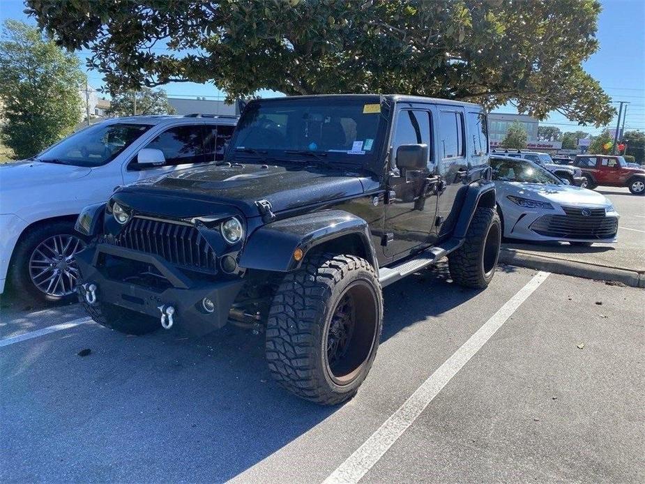 used 2015 Jeep Wrangler Unlimited car, priced at $20,991