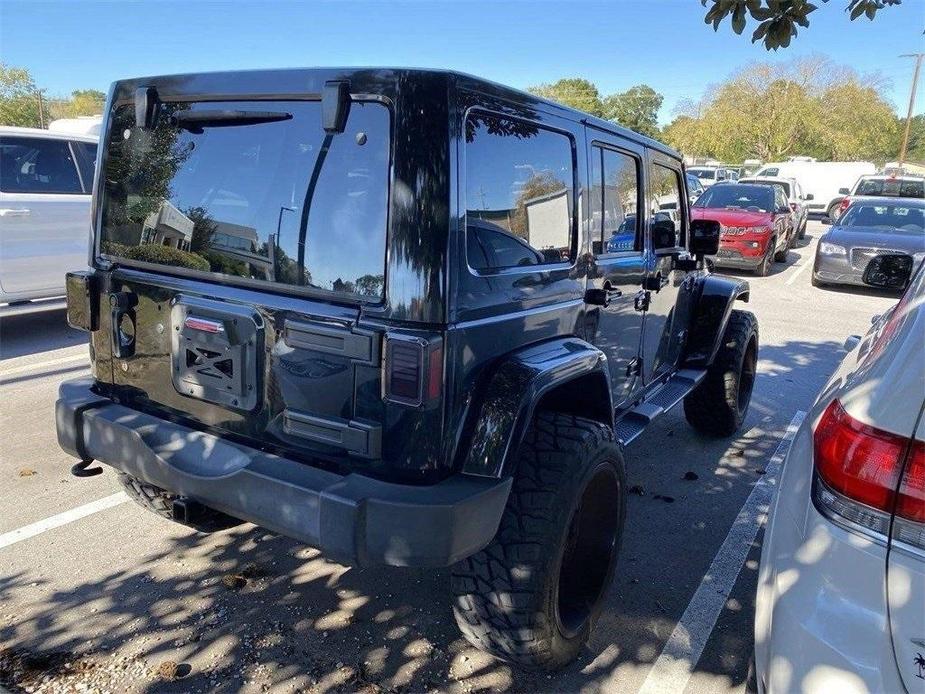 used 2015 Jeep Wrangler Unlimited car, priced at $20,991