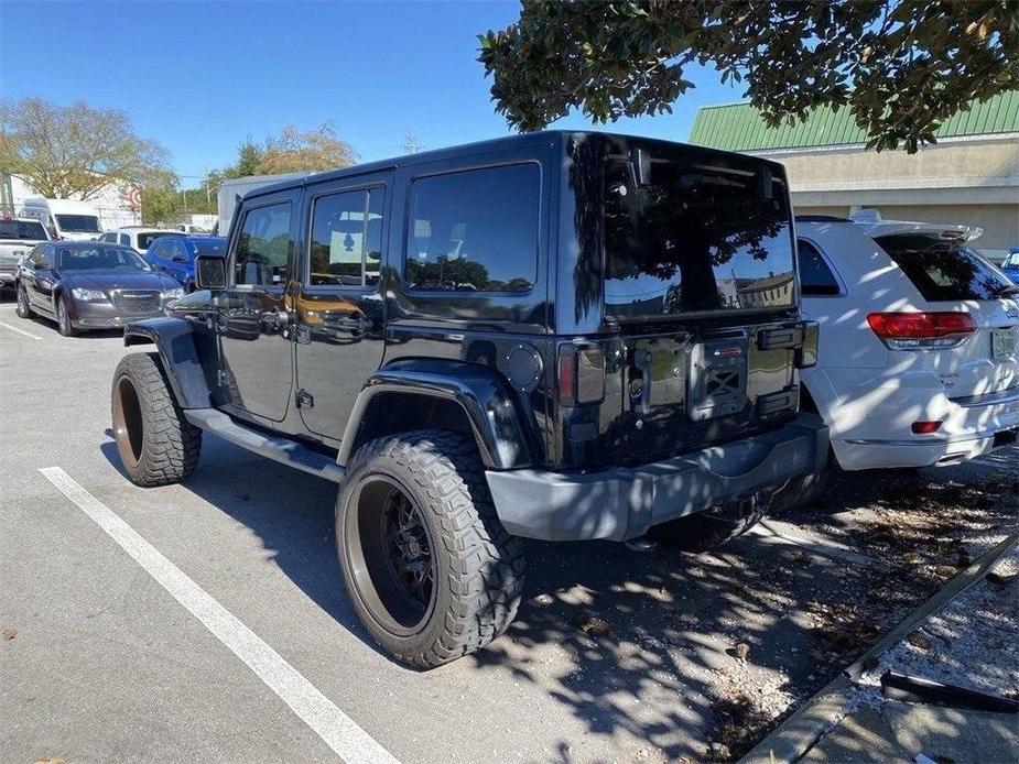 used 2015 Jeep Wrangler Unlimited car, priced at $20,991