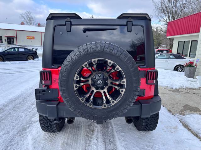 used 2018 Jeep Wrangler JK Unlimited car, priced at $27,950