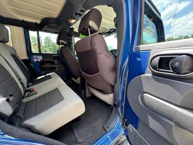 used 2010 Jeep Wrangler Unlimited car, priced at $13,950