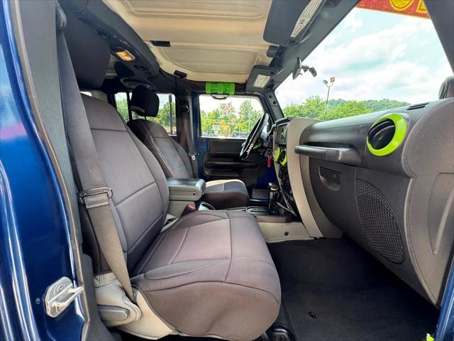 used 2010 Jeep Wrangler Unlimited car, priced at $13,950