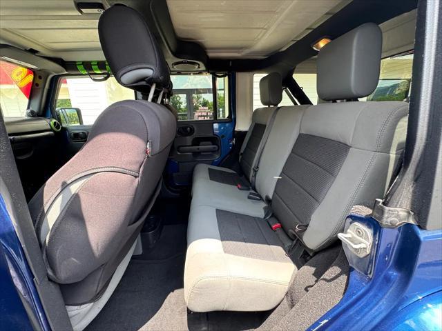 used 2010 Jeep Wrangler Unlimited car, priced at $13,950