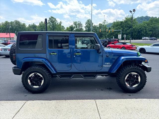 used 2010 Jeep Wrangler Unlimited car, priced at $13,950