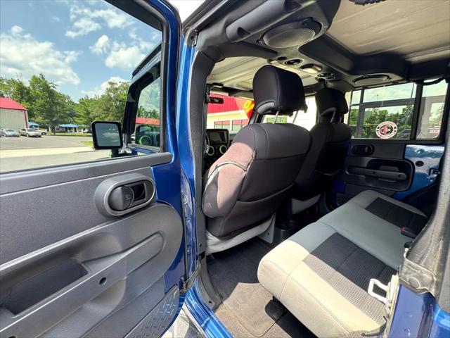 used 2010 Jeep Wrangler Unlimited car, priced at $13,950