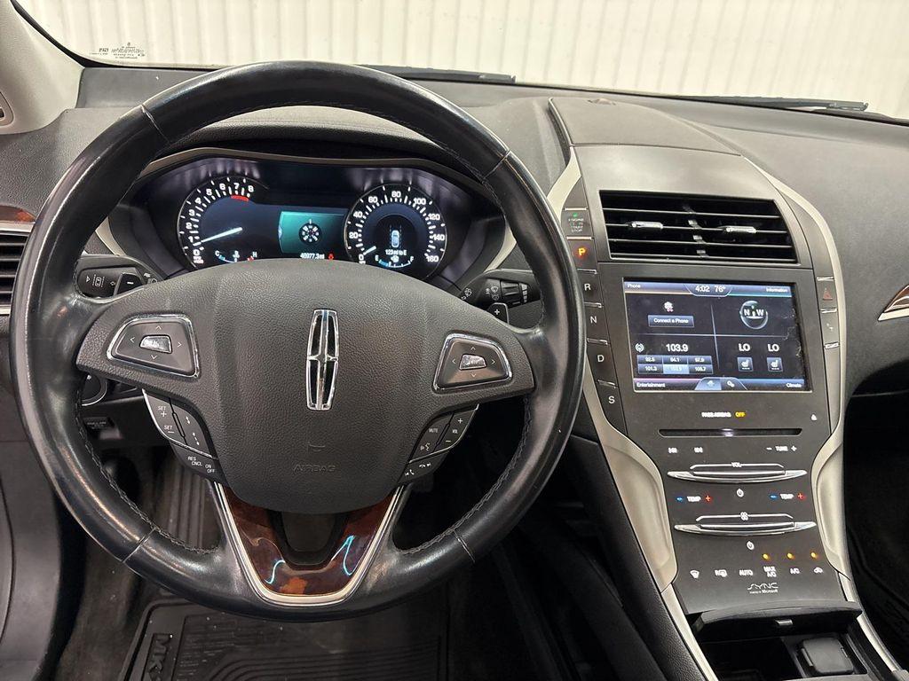 used 2015 Lincoln MKZ car, priced at $15,500