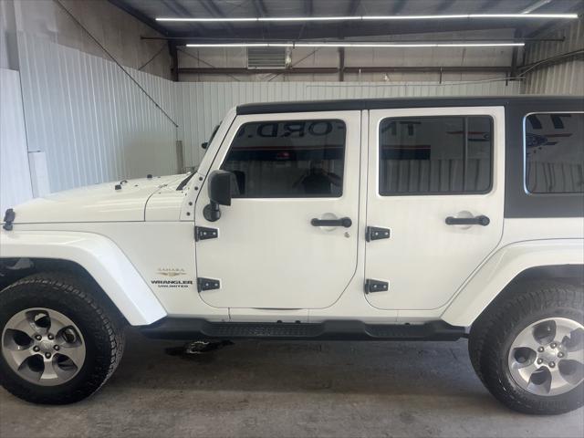 used 2015 Jeep Wrangler Unlimited car, priced at $17,997