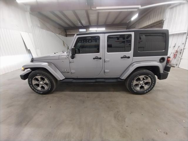 used 2018 Jeep Wrangler JK Unlimited car, priced at $22,997