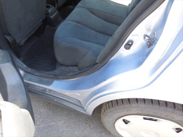 used 2009 Nissan Versa car, priced at $4,950