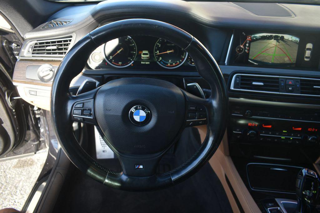 used 2015 BMW 740 car, priced at $17,999