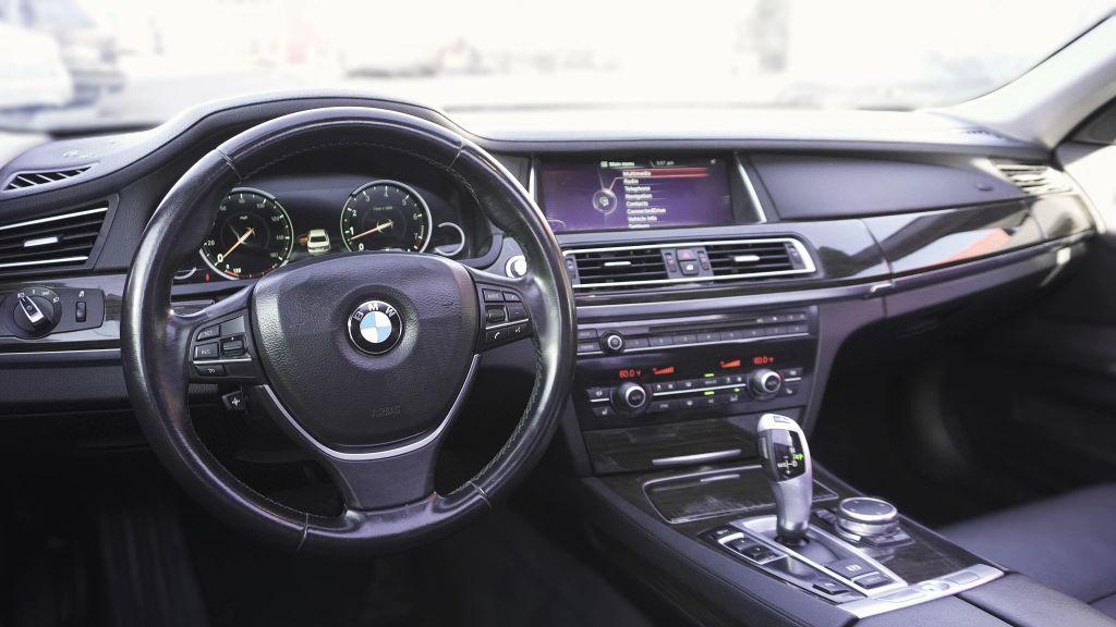 used 2015 BMW 740 car, priced at $14,499
