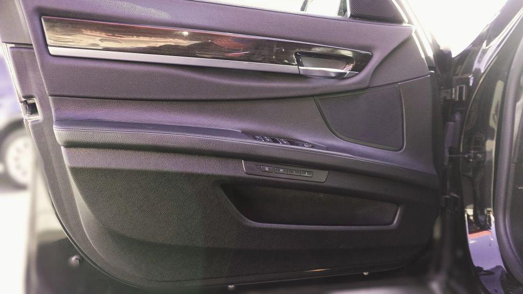 used 2015 BMW 740 car, priced at $14,499