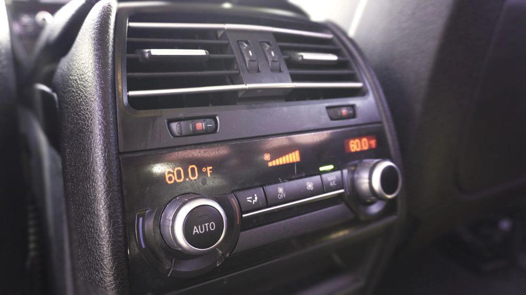 used 2015 BMW 740 car, priced at $14,499