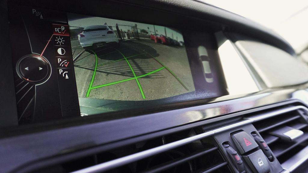 used 2015 BMW 740 car, priced at $14,499