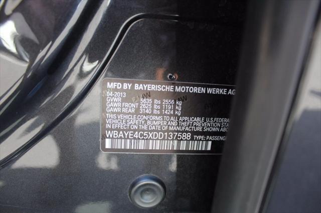 used 2013 BMW 750 car, priced at $13,499