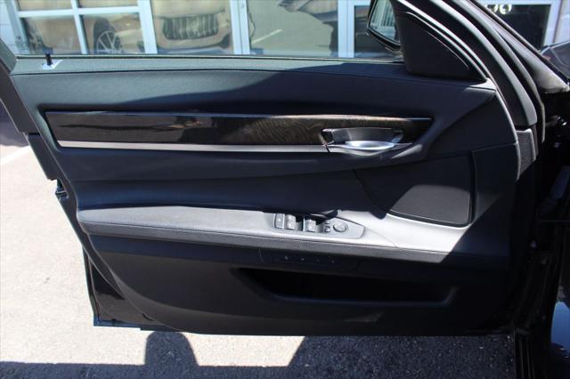 used 2013 BMW 750 car, priced at $13,499