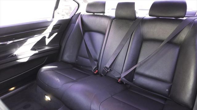 used 2015 BMW 750 car, priced at $14,499