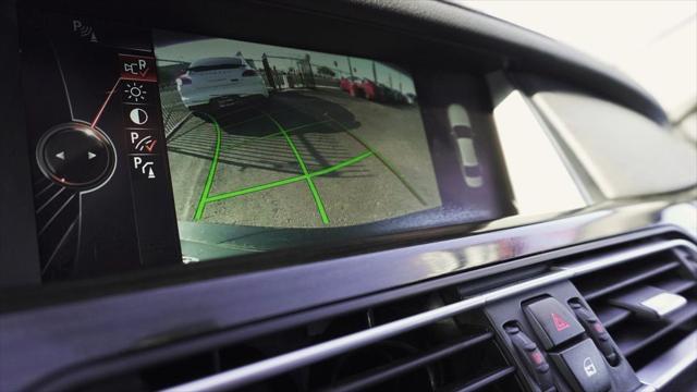 used 2015 BMW 750 car, priced at $14,499