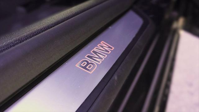 used 2015 BMW 750 car, priced at $14,499