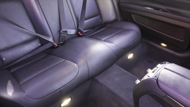 used 2015 BMW 750 car, priced at $14,499