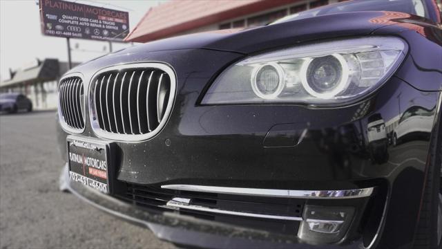 used 2015 BMW 750 car, priced at $14,499