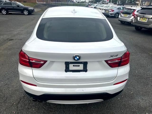 used 2015 BMW X4 car, priced at $10,795