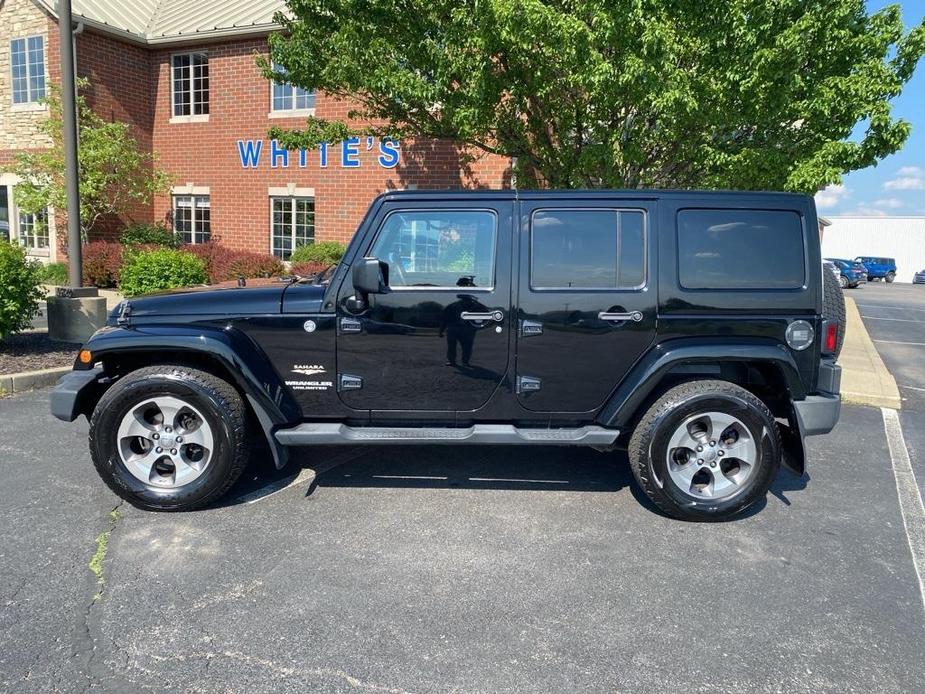 used 2012 Jeep Wrangler Unlimited car, priced at $15,884