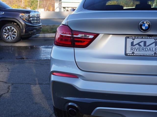 used 2018 BMW X4 car, priced at $23,990