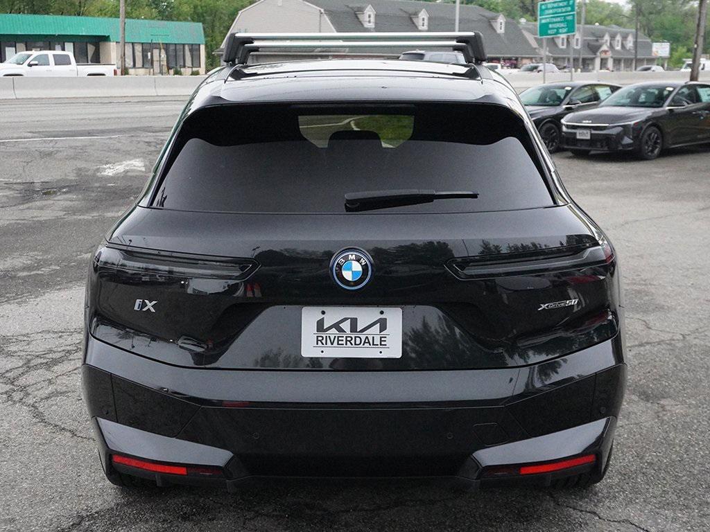 used 2024 BMW iX car, priced at $53,690